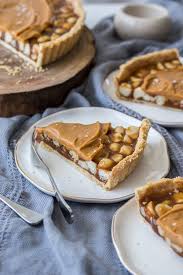 This Macadamia Salted Caramel Tart Recipe Is A Showstopper A Real Salted Caramel Tart Filling Wrapped Aro Tart Recipes Salted Caramel Tart Caramel Tart Recipe