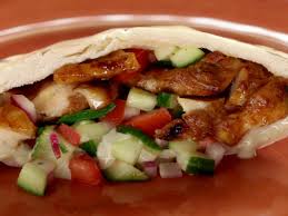 Chicken Shawarma With Tomato Cucumber Relish And Tahini Sauce Recipe Jeff Mauro Food Network Foodnetwork Com Food Network Recipes Recipes Food