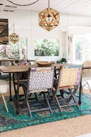 Crisp white walls replaced busy wood paneling here for a refreshing, more modern look. A Serene Bohemian Bungalow Boho Dining Room Patterned Dining Room Chairs Farmhouse Dining Rooms Decor