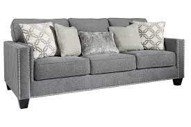 The sofa had staples which never touched the upholstery in the back area, a tear on the back and the cushions. Barrali Sofa Ashley Furniture Homestore
