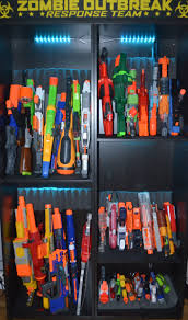 Mount the pegboard to the wall with mounting screws or choose a shoe organizer with pockets approximately the same width as your nerf guns to make sure they. Pin On Nerf Gun Storage And Display Cabinet