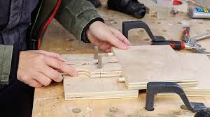 Homemade dowel jig constructed from a section of lumber and a construction washer. How To Make An Adjustable Doweling Jig 3x3 Custom