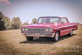 The '64 impala is considered by many to be a benchmark of the lowrider lifestyle, but for tomas requejo, his impala is a source of pride, as his it. Chevrolet Impala 64 Photograph By Claudia M Photography