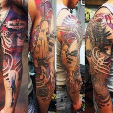 If you are fond of music in general, consider simply finding treble clef tattoos or staff lines as a way of expressing your musical identity. 60 Music Sleeve Tattoos For Men Lyrical Ink Design Ideas Music Tattoo Sleeves Sleeve Tattoos Tattoos For Guys
