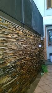 Muro Revestido Com Pedra Ferro Conhecida Tambem Como Filetes De Basalto Ferrugem Cabe Com Problemas De Manutencao Pedra Nao Requer Ma Basalto Ferrugem Pedras