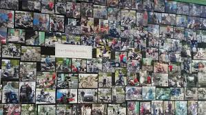 Stopped Inside Ez Bikes And Scooters In Exeter They Have A Huge Wall Of Photos Of Happy Scooter Owners So Cool Electric Bikes For Sale Electric Bike Scooter