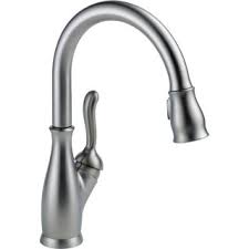 Although the features are similar to leland models, the look of this essa faucet is entirely different. Delta 9178 Ar Dst Arctic Stainless Leland Pull Down Kitchen Faucet With Magnetic Docking Spray Head And Shieldspray Includes Lifetime Warranty Faucetdirect Com