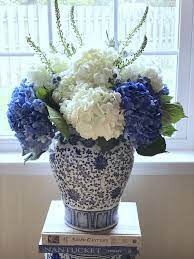 I've been obsessed with all things pheasant and in colors spot on for the season, this one i just couldn't resist. Beautiful Blue White Floral Arrangement In A Ginger Jar Flower Vase Design Blue And White Vase Flower Arrangements