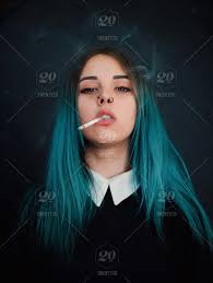 Wigs made of 100% human hair or remy human hair can be curled and styled, just like your own hair. Portrait Of Young Girl With Blue Hair Smoking Cigarette Stock Photo 2609e3cb 777d 49ba Aafd 1fee3c22f122