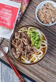 Niku Udon A Japanese Noodle Soup With A Seasoned Dashi Base Thick Udon Noodles And Thinly Sliced And Marinated Beef Udon Recipe Beef Udon Udon Noodles