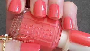 Really wish this was as pink as it looks both in the photo and in the bottle. Cute As A Button Persimmon Pink Nail Polish Nail Color Essie