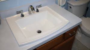 bathroom sink with a kohler archer sink