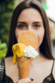 Portrait of Brunette Girl with Lemon and Vanilla Ice Cream in Summer Stock  Image