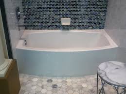 Frameless design emphasizes glass and creates a sleek, minimalist look. The Tile Shop Design By Kirsty Cool New Tub From Kohler Tub Sizes Small Bathroom Bathroom Tub