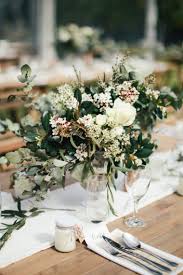 An Elegant Modern Vintage Wedding With A Marquee Reception Chic Vintage Brides Modern Vintage Weddings Wedding Floral Centerpieces Vintage Wedding Photos