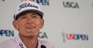 Part-time Uber driver Henson travels world to get to U.S. Open