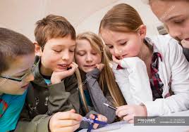 Group of children learning together in classroom — education, thinking -  Stock Photo | #181896292