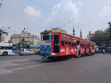 Historic electric tram trundling through Kolkata, AI generated