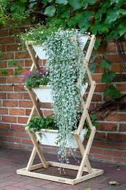Bist Du Auch Schon Ein Hochstapler Perfekt Passt Der Vertikale Garten Nach Innen Und Aussen Vertikaler Garten Hochbeet Vertikale Pflanzer