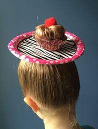 Petals were cut from white card stock, hot glued to bobby pins, and fastened to try out the basic bunny bun hair tutorial; 18 Crazy Hair Day Ideas For Girls Boys Bright Star Kids