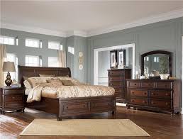 Porter House King Sleigh Bed With Storage Footboard By Ashley Furniture Brown Wood Bedroom Furniture Bedroom Furniture Sets Brown Wood Bedroom