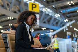 410+ Business Woman Working On Laptop In International Airport Stock  Photos, Pictures & Royalty-Free Images - iStock