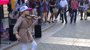 Young Ukrainian Immigrant Street Performer Karolina Protsenko