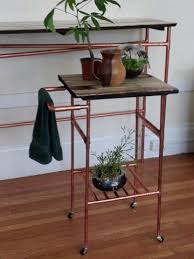 Using a 7/8 butterfly drill bit, drill into the wood about 1/2. Easy Copper Pipe And Reclaimed Wood Table 5 Steps With Pictures Instructables