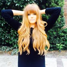 Blonde highlights is a must have trend, applicable for any base hair. Long Strawberry Blonde Red Wavy Hair With Blunt Bangs Vintage Hairstyles For Long Hair Hair Styles Long Hair Styles