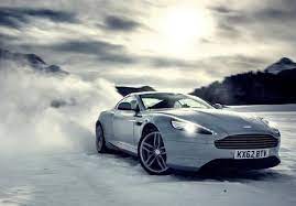 Aston Martin Db9 Playing In The Snow Aston Martin Aston Martin Vanquish Aston