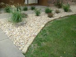 Pin By Leslie Dietz On Garden Ideas Stone Landscaping Landscape Edging Gravel Landscaping