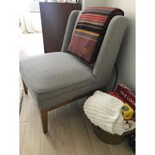 Modern and bold, this design icon is at its best in a monochromatic room. West Elm Light Grey Armless Accent Chair Aptdeco