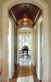 Love Arched Ceiling And Moulding With Dark Wood Very Dramatic Against All The Neutral Elegant Homes Interior Architecture