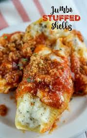 Olive Garden Introduced New Jumbo Features And One Was The Jumbo Stuffed Shells They Re Stuffed With Four C Jumbo Shell Recipes Diner Recipes Manicotti Recipe