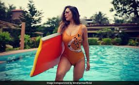 Getty her 400m was impressive enough. Kim Sharma Makes A Splash On Instagram With Pics From Her Goa Diaries