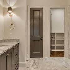 Clutter is clutter even behind a closet door. Dark Gray Linen Closet Door Design Ideas