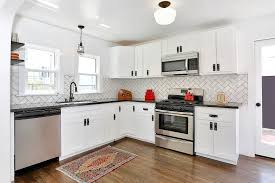 A neutral herringbone tile backsplash could be the perfect contrast. Herringbone Subway Tile Houzz