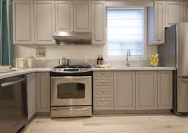 small kitchen with gray cabinets and