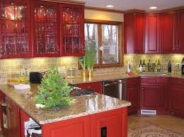 Red Kitchen Cherry Cabinets With Cinnabar Stain Tumbled Stone Backsplash Granite Counter Tops P Red Kitchen Cabinets Country Kitchen Designs Kitchen Design
