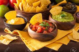 Remove chips from oven and place on a serving dish. Mexikanische Nachos Tortilla Chips Mit Guacamole Salsa Und Kase Dip Lizenzfreie Fotos Bilder Und Stock Fotografie Image 91746595