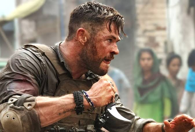 Chris Hemsworth Is Fighting Fit in New Look at Netflix Action Thriller  Sequel