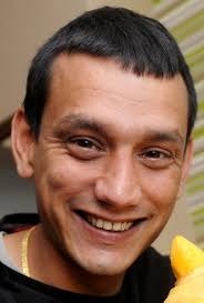 Stay-at-home dad creates stunning winter landscapes in his neighbours'  windows using snow spray and a stanley knife