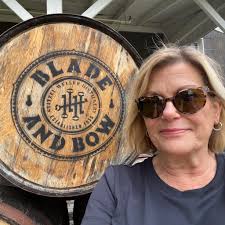 How much do you suggest to pay a high schooler to dogsit when out of town  per day? They will let one dog out 3-4x a day and live a couple houses