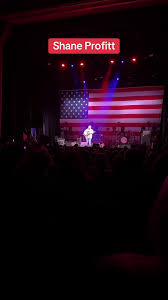 Man, Shane Profitt is crushin' it up there! 🎤🔥 This dude's got some  serious talent and the crowd's lovin' it. Can’t wait for Aaron Lewis to hit  the stage! Gonna be one heck of a night! #CountryVibes ...