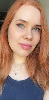 Can someone edit the image to a festive green shirt?