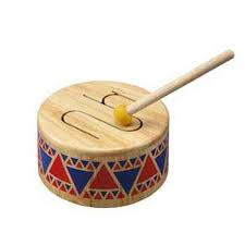 Wooden xylophone musical instruments that can be pulled along with a string. Toy Musical Instruments At The Wooden Wagon