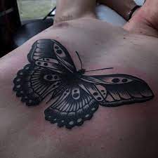 10 Sweet Blackwork Butterfly Tattoos Tattoodo Butterfly Neck Tattoo Black Butterfly Tattoo Tattoos