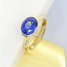 Blue Sapphire And Yellow Gold Engagement Ring With Rubover Setting Engagement Rings Sapphire Yellow Gold Engagement Rings Solitaire Engagement Ring