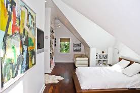 I love how the color essentially wraps around and gives you a warm feeling almost like a visual hug. 15 Charismatic Sloped Ceiling Bedrooms Home Design Lover