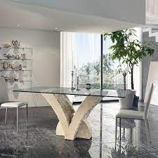 Available in 4 tabletop finishes, dark grey stone ceramic, light grey stone ceramic, walnut veneer, and matt white lacquered. Pappillo Fossil Stone Dining Table Stones Dining Room Furniture Stone Dining Table Dining Table Dining Room Table Centerpieces